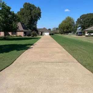 Clean driveway after pressure washing