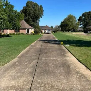 Dirty driveway before pressure washing